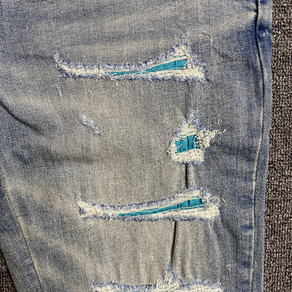 AMIRI VARSITY LOGO JEANS - Prime Reps