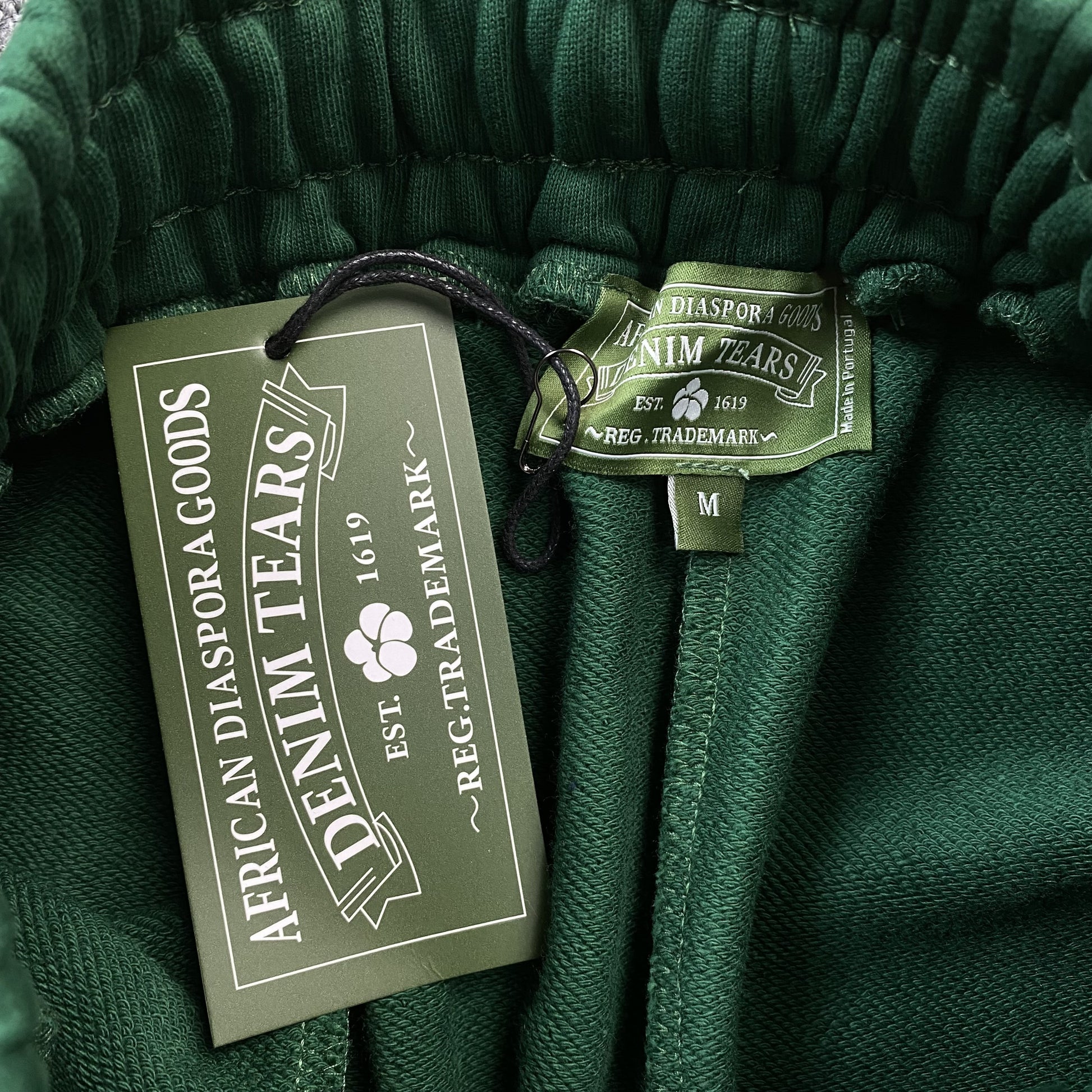 DENIM TEARS COTTON WREATH SWEATPANTS GREEN - Prime Reps